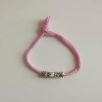 Bracciale rosa con charm