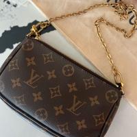 Pochette multifunzione Louis Vuitton