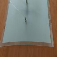 Corpo illuminante a sospensione in vetro curvo