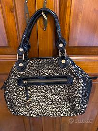 Borsa Loristella in pelle verniciata e pizzo