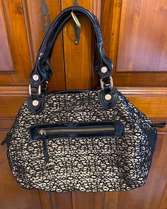 Borsa Loristella in pelle verniciata e pizzo