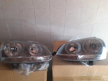 FARI ANTERIORI VW GOLF 5 – NUOVI MAI MONTATI