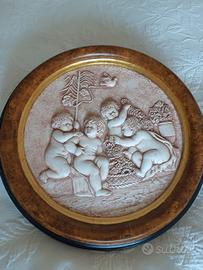 tondo con putti in gesso 