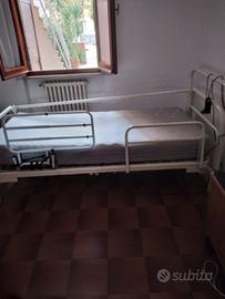 Letto elettrico con sponde e materasso ortopedico