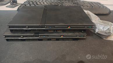 playstation2 con giochi e accessori
