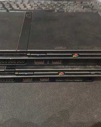 playstation2 con giochi e accessori