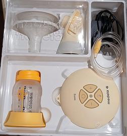 tiraLatte  e sterilizzatore