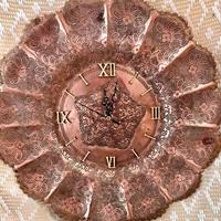 Orologio in rame antico