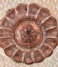 Orologio in rame antico