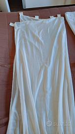 Tende bianche con passanti