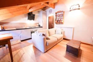 Mansarda bilocale travi a vista