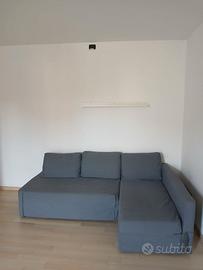 Divano letto grigio