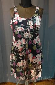 Costume intero con gonnellino incorporato  XL