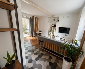 Bilocale in contesto tranquillo con posto auto