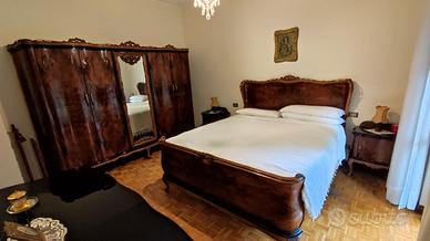 Camera da letto stile Chippendale