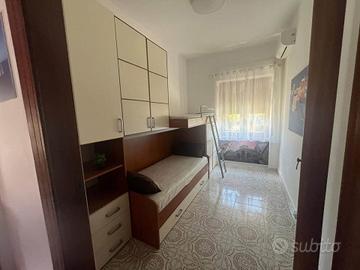 Cameretta a ponte tre posti letto