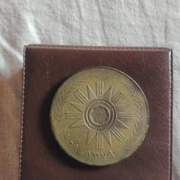 moneta commemorativa irachena