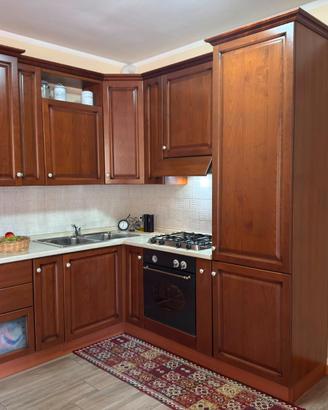 Cucina Angolare  in Ciliegio massello con ELETTR.