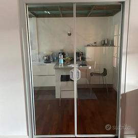 Porta doppia a scrigno Rimadesio