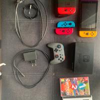 Nintendo switch + controller + giochi + omaggio