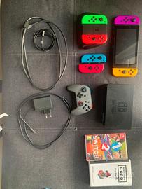 Nintendo switch + controller + giochi + omaggio