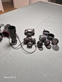 Canon A1 completa di teleobbiettivi, grandang. Etc