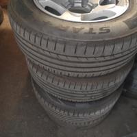 cerchi 15 + gomme montati su Nissan king cab d 21 