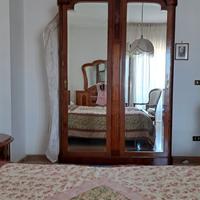 Camera da letto e mobile antico