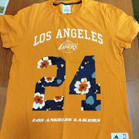 T-shirt arancione Adidas