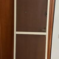 Zanzariera in alluminio a pannello fisso per grate