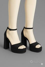 Scarpe nere con tacco largo e plateau