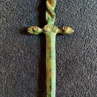 Tagliacarte antico bronzo fuso con teste di arieti