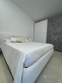 Letto contenitore matr. 160x190 e materasso.