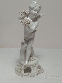 Putto in porcellana della Manifattura Triade