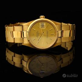 Rolex Oyster Perpetual Date 34 mm 18 kt gold 15238