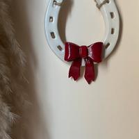 decorazione parete casa nuova ferro di cavallo