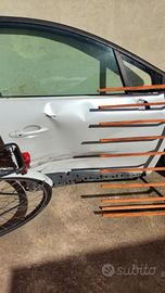 sportello clio incidentato