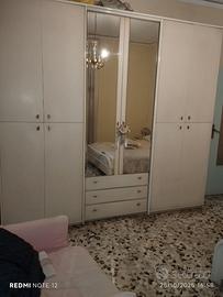 Camera da letto - parete attrezzata