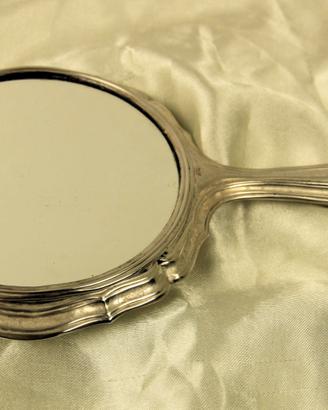 Specchio da toilette in argento.