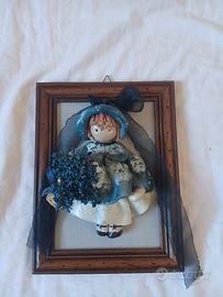 quadretto  con bambolina  in ceramica  