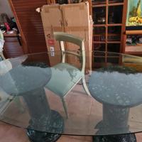 TAVOLO ELLITTICO IN CRISTALLO CON COLONNE IN MARMO