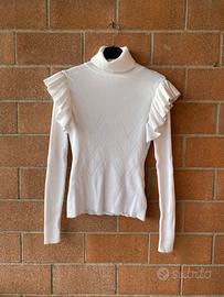 Maglione bianco a collo alto con balze