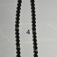 Collana perle cromate verdi co pendente floreale