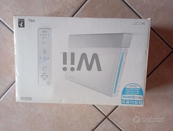 Nintendo Wii + giochi doppio controller volanti
