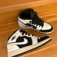 Jordan 1 mid bianche e nere