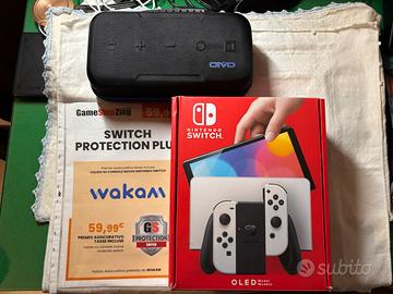 Nintendo switch oled 7” 64gb + 3 giochi