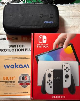 Nintendo switch oled 7” 64gb + 3 giochi