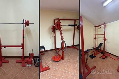 Rack squat con bilanciere – 3 attrezzi