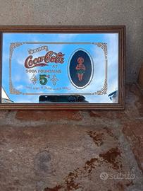 Targa insegna Coca Cola
