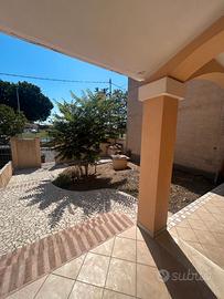 Villa con giardino